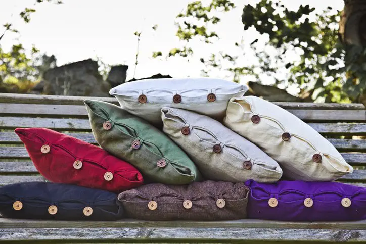 pile of bench cushions outdoors