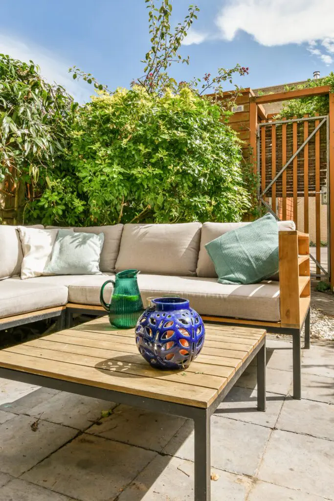 Outdoor bench seat cushions and matching garden sofa pads in neutral colours